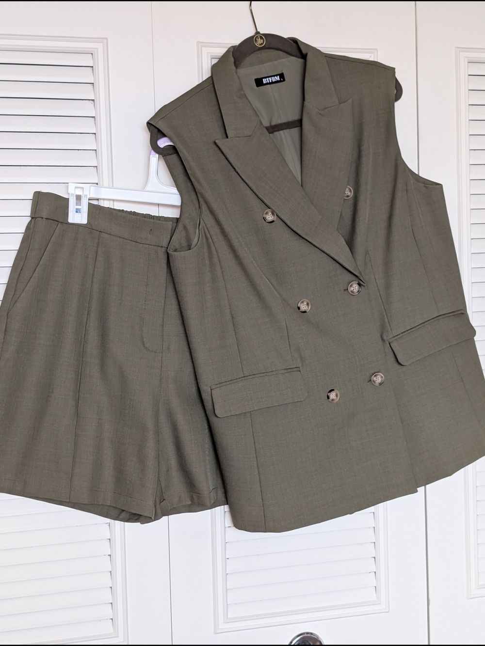 Stylish Women's Olive Green Tailored Sleeveless Suit Jacket & Bermuda Shorts Out